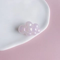 Macro shot of a light purple puffy cloud acrylic bead with a pearlescent finish - 16#