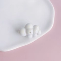 Close-up of pearl white acrylic cloud bead with center hole for DIY jewelry making - 17#