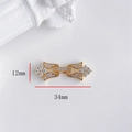 Vista macro dettagliata del connettore per gioielli in zirconia dorata da 34 mm - Fibbia Rosa