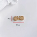 Dettaglio del connettore a cuore dorato con pietre di zircone, larghezza di 25 mm - Fibbia Zirconia Traforata