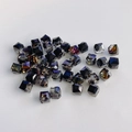 Macro shot of square faceted glass beads with iridescent purple gold AB coating for DIY crafts - Dark Gray Iridescent