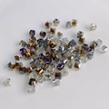 Macro shot of faceted crystal glass square beads with iridescent AB coating for DIY jewelry - Amber Purple AB