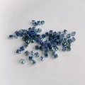 Macro detail of cube-cut blue crystal glass beads with AB iridescent finish for DIY jewelry - Dark Blue AB