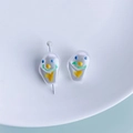Macro detail of acrylic resin pearl beads with hand-painted colorful quirky faces - Yellow Heart Smiley Style (5#)