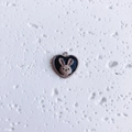 Macro detail of heart-shaped chocolate cookie rabbit pendant for DIY jewelry making - Heart Rabbit Brown