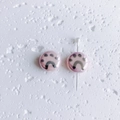 Detail of pink ceramic round beads with black cat paw prints and smooth glazed finish - Pink (1#)
