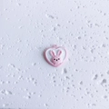 Detail of pink heart pendant featuring cute rabbit relief and top ring for DIY jewelry - Heart Rabbit Pink