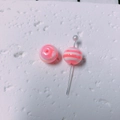 Detailed macro of pink and white striped acrylic candy beads on a pearlized metal pin - Pink and White Striped (5#)