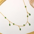 Gold titanium steel necklace with green zircon waterdrop pendants on a mirror - Waterdrop Round Green Zirconia Necklace (81236) / Gold