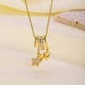 Gold plated necklace featuring micro-set zircon star and footprint pendants on satin stone - Starfish And Footprint (81482)
