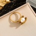 Macro detail of 18k gold starfish shell ring with a large white pearl inlay - Pearl Shell Ring (Gold)