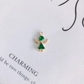 Detailed macro view of an angel-shaped pendant with green zircon and gold plating - Emerald Green (2#)