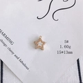 Macro shot of 18k gold plated star pendant with cubic zirconia on white display card - Five-pointed Star Style (5#)