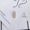 Detailed view of gold plated pendant with three zircons measuring 24x9mm and weighing 1.93g - Vertical Triple Diamond Style (8#)