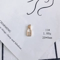 Detailed view of a gold-plated bottle-shaped pendant with white zircon and size 20x8mm - Bottle Shape Style (11#)