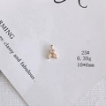 Macro shot of 18K gold plated leaf pendant with white zircon stones on display card - Abstract Bee Leaf Style (25#)