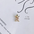Detailaufnahme des Legierungsemail-Anhängers Buchstabe X mit rosa Hasen- und Blumencharme - Buchstabe X