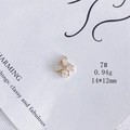 Détail du pendentif moulin à vent doré 14x12mm avec pierres de zircone et poids de 0,94g - Taille 7