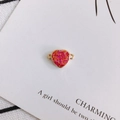 Detail of magenta resin heart pendant with gold metal frame and dual loops for DIY jewelry - Rose Red
