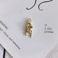 Macro detail of a gold hand gesture charm with polished finish and dimensional details - Rock Hand Gesture Style (1#)