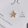 Macro detail of star-shaped gold pendant with cubic zirconia stones and 19x16mm dimensions - Flower Inside Star (7#)