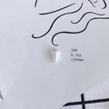 Macro shot of 12x9mm silver cone-shaped DIY metal charm with polished mirror finish - Silver Glossy Cone Shape (39#)
