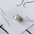 Detail of a 19.5x20mm round pearl pendant with a gold rim and rhinestone accents - Round Bead Arch Style (3#)