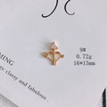 Macro detail of a 16x15mm gold-plated bow and arrow charm with triangular zircon stone - Creative Bow and Arrow (9#)