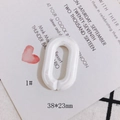 Macro view of creamy white acrylic oval link with marble texture, 38x23mm size - Marble Creamy White (1#)