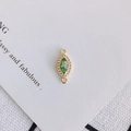 Detailed view of gold-rimmed marquise resin pendant with white zircon inlays and dual loops - Lake Blue Aurora (5#)
