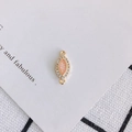 Detailed view of pink resin marquise charm with gold trim and white zircon accents - Pink (7#)