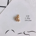Detailed macro view of a 16x12mm 18K gold plated unicorn pendant with clear zircon stones - Unicorn Shape (21#)