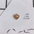 Macro view of a 14x13mm gold plated heart pendant with zircon border and Love lettering - Heart Love (24#)