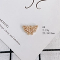Macro view of a gold plated butterfly pendant with pavé cubic zirconia for DIY jewelry - Butterfly Style (6#)