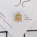 Macro detail of a 28x16.5mm gold hollow cloud pattern lock pendant with three mini bells - Safety Lock Style (7#)