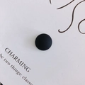 Close-up of matte black resin half-round beads showing fine frosted texture on white paper - Black (4#)