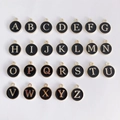 Detailed grid of 26 alphabet charms in gold metal with black enamel for DIY jewelry - Set of 26 Letters