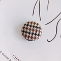 Macro view of round houndstooth fabric buttons for sweaters with textured weave detail - Background Copyright Infringement - Chanel (prop Only) / Coffee Black Plaid Weave Style (6#)