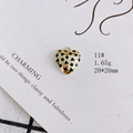 Detail of heart-shaped gold alloy pendant with black enamel star and clover motifs - Enamel Star Clover Heart Style (11#)