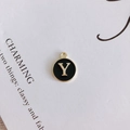 Detail of round black enamel pendant with gold letter Y charm for DIY necklace making - Letter Y