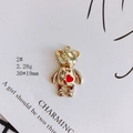 Detailed view of golden bear pendant with red heart for DIY jewelry necklaces - Stitched Bear (2#)