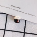 Detailed view of hand-painted ceramic lucky cat bead with floral patterns for DIY jewelry - Black Red Gold Floral Style (3#)