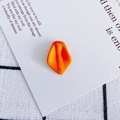 Macro detail of matte orange petal pendant with top hole for DIY earring jewelry making - 4#