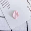 Detailed view of a pink resin flower petal charm with a hole for DIY jewelry making - 5#