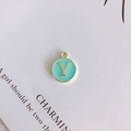 Detail view of round gold enamel letter Y pendant for DIY jewelry making material - Letter Y