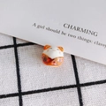 Macro shot of handcrafted ceramic lucky cat bead with floral kimono details - Orange Floral Style (3#)