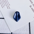 Macro detail of dark blue resin petal charm with matte finish and pre-drilled hole for DIY - Size 11