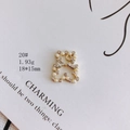 Detailed view of a gold bear pendant with inlaid pearls and crystals, size 18x15mm - Bow Pearl Bear (20#)