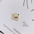 Macro shot of 18mm golden bear pendant with white enamel for DIY jewelry making - Red Dot White Bear (22#)