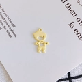 Detailansicht eines gelben Zeichentrick-Jungen-Anhängers mit geometrischem Hohldesign - Gelber Jungenstil (1#)